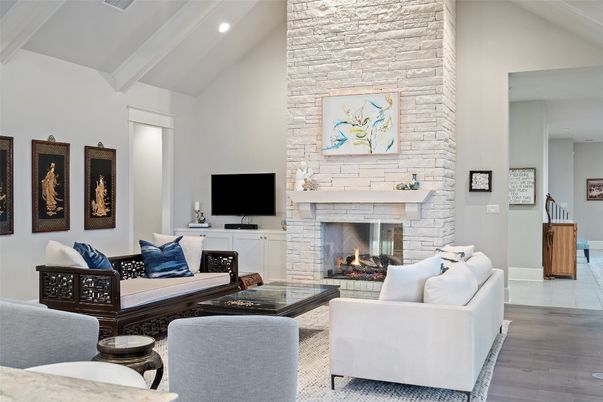 Fireplace, Interior, Living room, Recessed Lighting, Stone Walls, Wood Texture Flooring