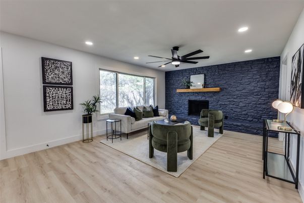 Fireplace, Interior, Living room, Recessed Lighting, Stone Walls, Wood Texture Flooring
