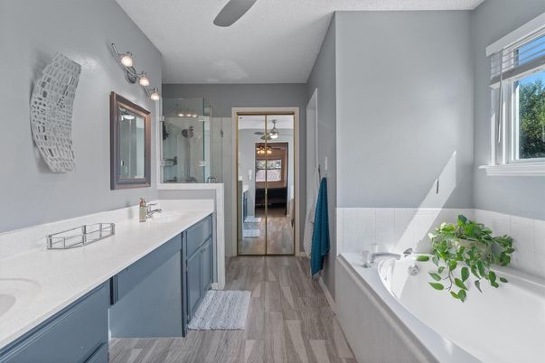 Bathroom, Dual Sink Vanities, Glass Shower, Interior, Wood Texture Flooring