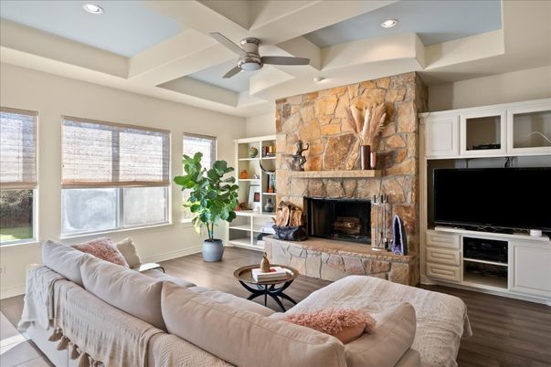 Fireplace, Interior, Living room, Recessed Lighting, Stone Walls, Wood Texture Flooring