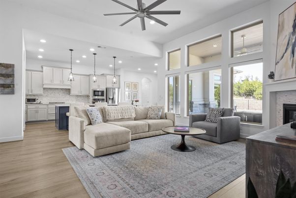 Fireplace, Interior, Kitchen, Living room, Pendant Lights, Recessed Lighting, Stainless Steel Appliances, Wood Texture Flooring