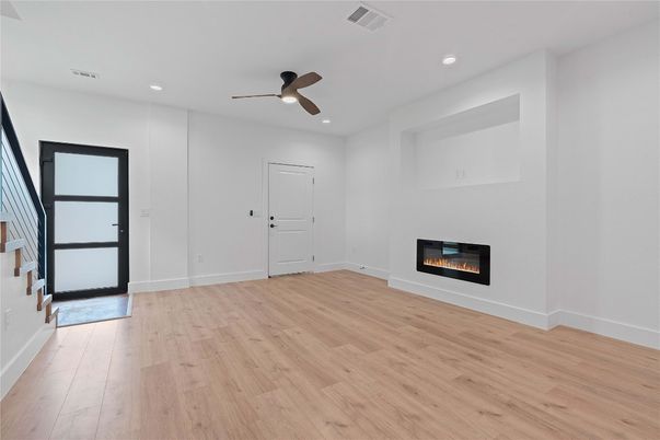Empty room, Fireplace, Interior, Recessed Lighting, Wood Texture Flooring