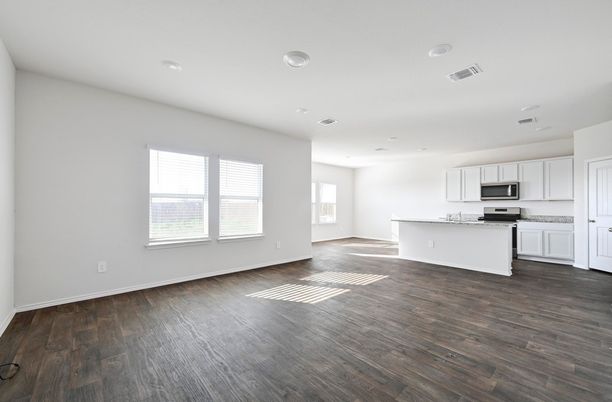 Empty room, Interior, Kitchen, Recessed Lighting, Stainless Steel Appliances, Wood Texture Flooring