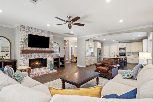 Fireplace, Interior, Kitchen, Living room, Recessed Lighting, Stainless Steel Appliances, Stone Walls, Wood Texture Flooring
