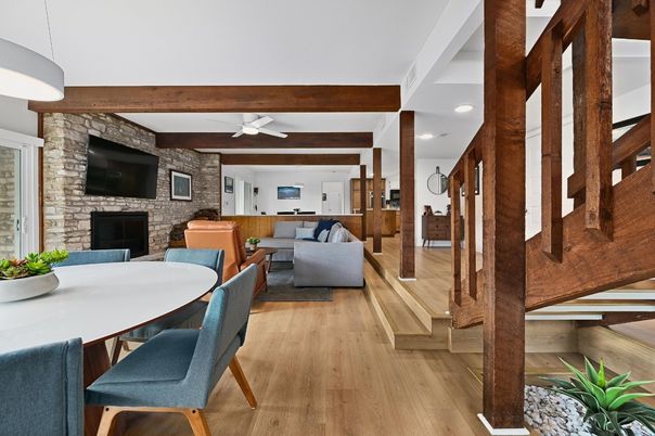 Dining room, Fireplace, Interior, Living room, Pendant Lights, Recessed Lighting, Stone Walls, Wooden Beams, Wood Texture Flooring