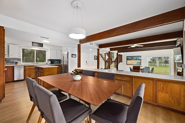 Dining room, Interior, Kitchen, Pendant Lights, Recessed Lighting, Stainless Steel Appliances, Wood Texture Flooring