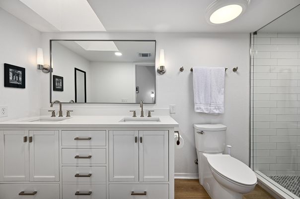 Bathroom, Dual Sink Vanities, Glass Shower, Interior, Recessed Lighting, Wood Texture Flooring