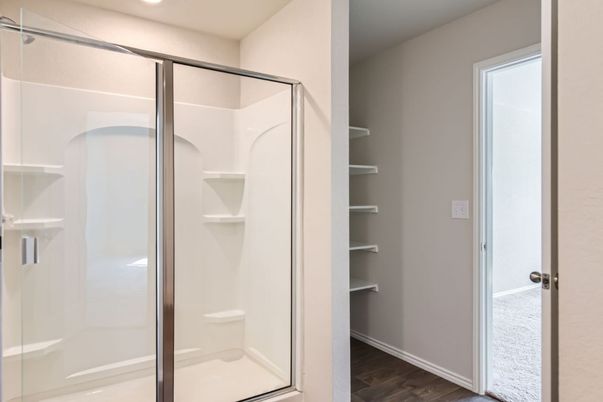 Bathroom, Glass Shower, Interior, Recessed Lighting, Walk-in Closets, Wood Texture Flooring