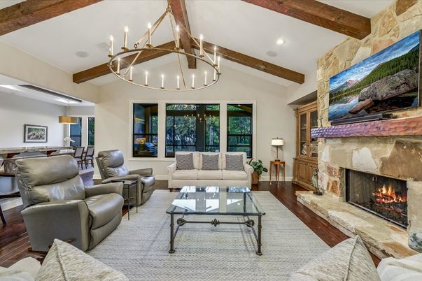 Dining room, Fireplace, Interior, Living room, Pendant Lights, Recessed Lighting, Stone Walls, Wooden Beams, Wood Texture Flooring