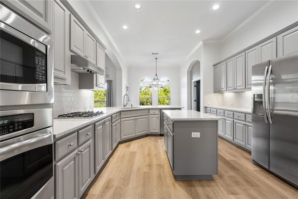 Interior, Kitchen, Pendant Lights, Recessed Lighting, Stainless Steel Appliances, Wood Texture Flooring