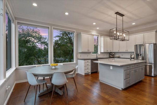 Dining room, Interior, Kitchen, Pendant Lights, Recessed Lighting, Stainless Steel Appliances, Wood Texture Flooring