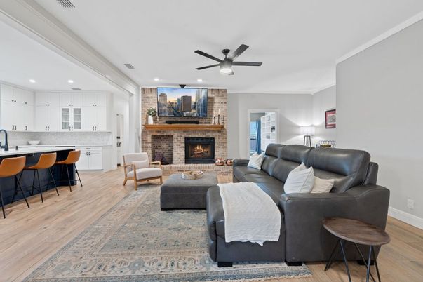 Fireplace, Interior, Kitchen, Living room, Recessed Lighting, Stone Walls, Wood Texture Flooring