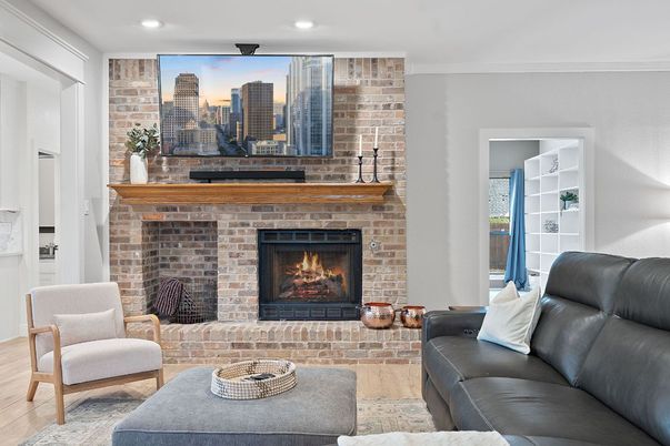 Fireplace, Interior, Living room, Recessed Lighting, Stone Walls, Wood Texture Flooring