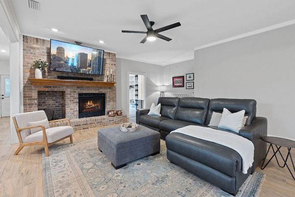 Fireplace, Interior, Living room, Recessed Lighting, Stone Walls, Wood Texture Flooring