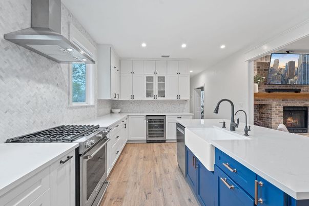Fireplace, Interior, Kitchen, Recessed Lighting, Stainless Steel Appliances, Stone Walls, Wood Texture Flooring