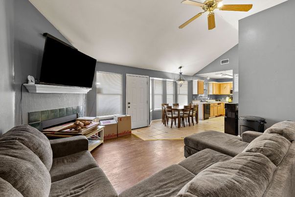 Chandelier, Dining room, Fireplace, Interior, Kitchen, Living room, Pendant Lights, Wood Texture Flooring