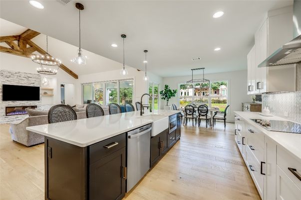 Dining room, Fireplace, Interior, Kitchen, Living room, Pendant Lights, Recessed Lighting, Stainless Steel Appliances, Stone Walls, Wooden Beams, Wood Texture Flooring
