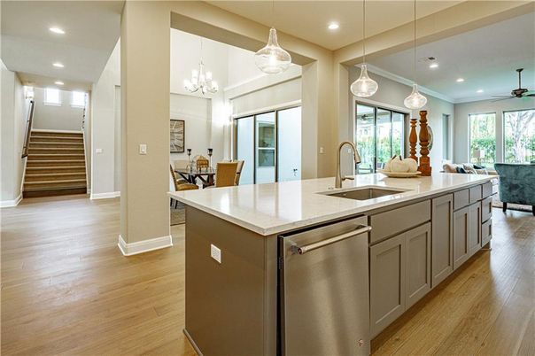 Dining room, Interior, Kitchen, Living room, Pendant Lights, Recessed Lighting, Stainless Steel Appliances, Wood Texture Flooring