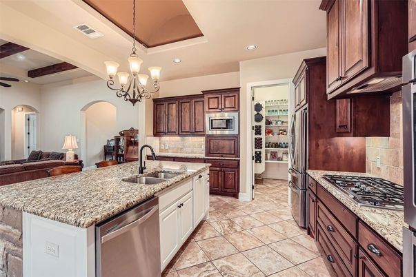 Chandelier, Interior, Kitchen, Pendant Lights, Recessed Lighting, Stainless Steel Appliances, Wooden Beams