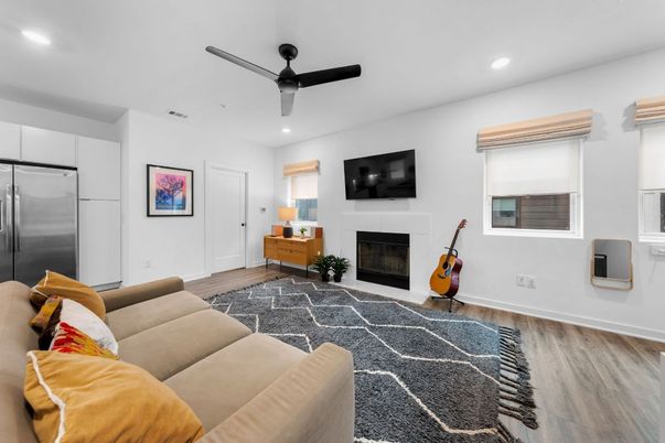 Fireplace, Interior, Living room, Recessed Lighting, Stainless Steel Appliances, Wood Texture Flooring
