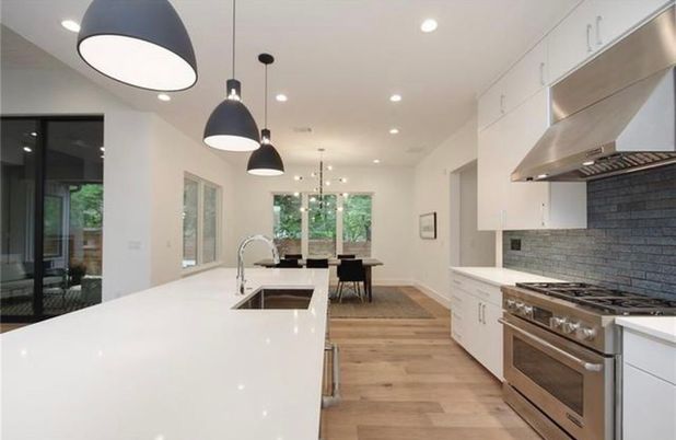 Dining room, Interior, Kitchen, Pendant Lights, Recessed Lighting, Stainless Steel Appliances, Wood Texture Flooring