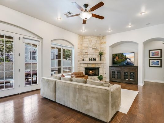 Fireplace, Interior, Living room, Recessed Lighting, Stone Walls, Wood Texture Flooring