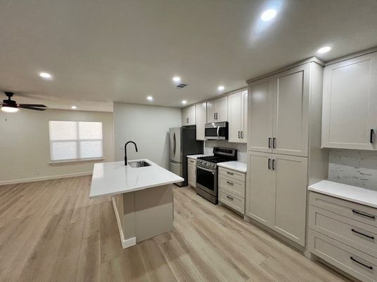Interior, Kitchen, Recessed Lighting, Stainless Steel Appliances, Wood Texture Flooring