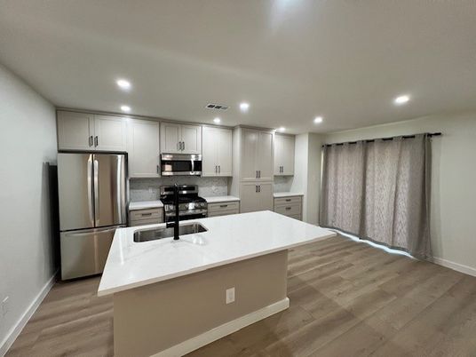 Interior, Kitchen, Recessed Lighting, Stainless Steel Appliances, Wood Texture Flooring