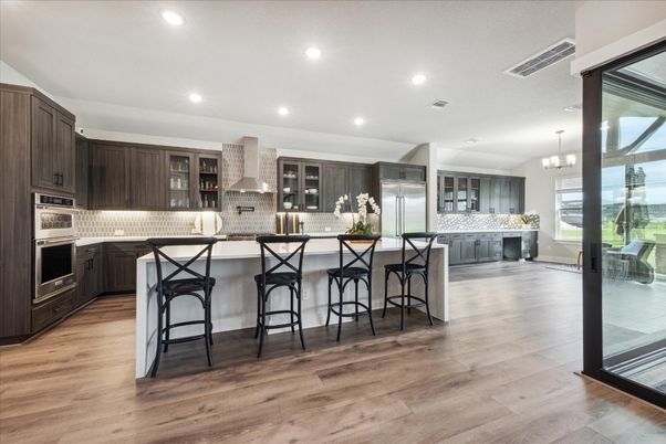 Chandelier, Interior, Kitchen, Recessed Lighting, Stainless Steel Appliances, Wood Texture Flooring