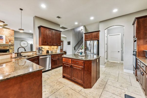 Interior, Kitchen, Pendant Lights, Recessed Lighting, Stainless Steel Appliances, Stone Walls
