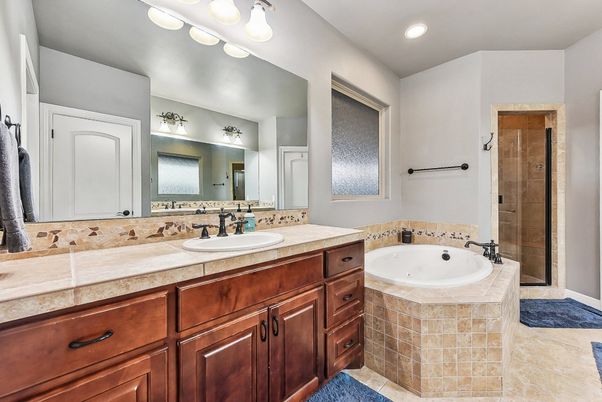 Bathroom, Dual Sink Vanities, Interior, Recessed Lighting, Tile Countertops