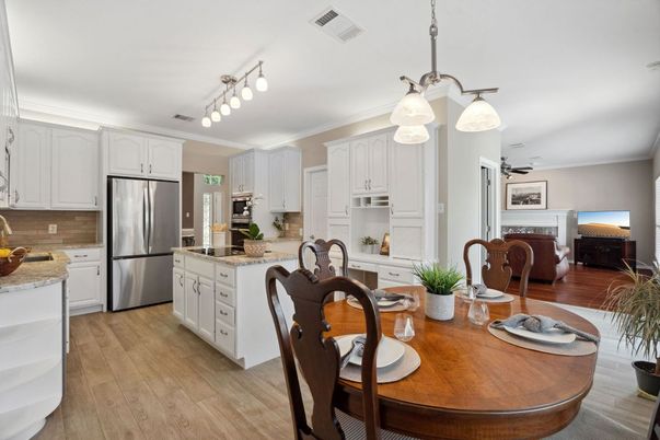 Dining room, Interior, Kitchen, Pendant Lights, Stainless Steel Appliances, Wood Texture Flooring