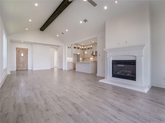 Empty room, Fireplace, Interior, Kitchen, Pendant Lights, Recessed Lighting, Wooden Beams, Wood Texture Flooring