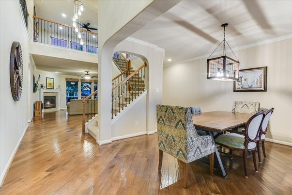 Dining room, Fireplace, Interior, Pendant Lights, Recessed Lighting, Wood Texture Flooring