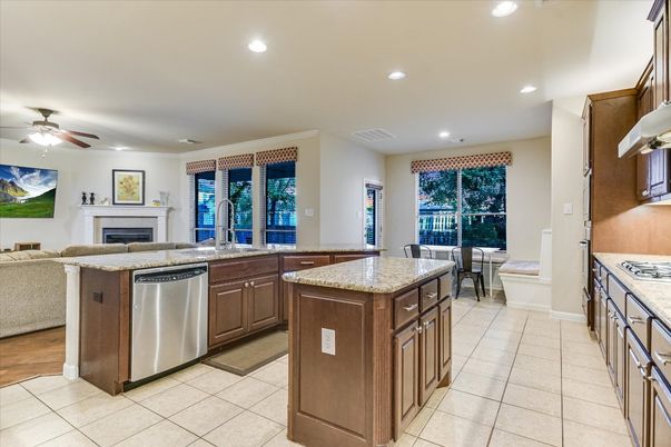 Dining room, Fireplace, Interior, Kitchen, Recessed Lighting, Stainless Steel Appliances