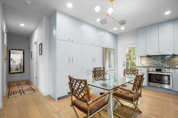 Dining room, Interior, Kitchen, Pendant Lights, Recessed Lighting, Stainless Steel Appliances, Wood Texture Flooring