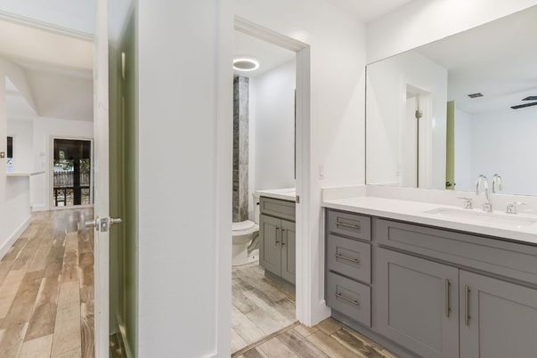 Bathroom, Dual Sink Vanities, Interior, Recessed Lighting, Wood Texture Flooring