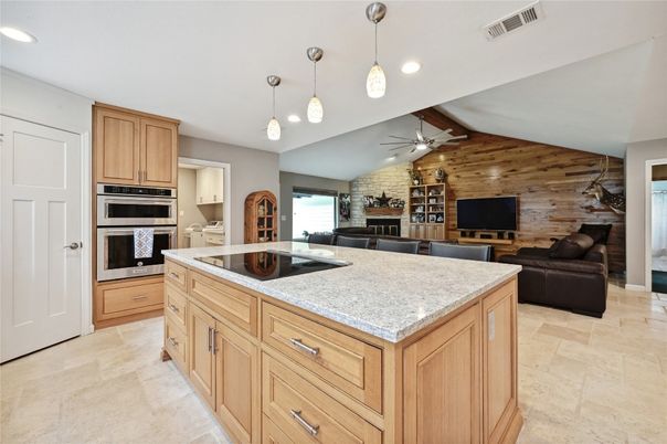Interior, Kitchen, Living room, Pendant Lights, Recessed Lighting, Stainless Steel Appliances, Stone Walls, Wooden Walls