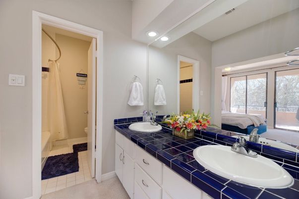 Bathroom, Dual Sink Vanities, Interior, Recessed Lighting, Tile Countertops