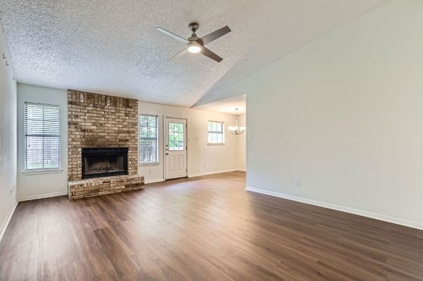 Chandelier, Empty room, Fireplace, Interior, Stone Walls, Wood Texture Flooring