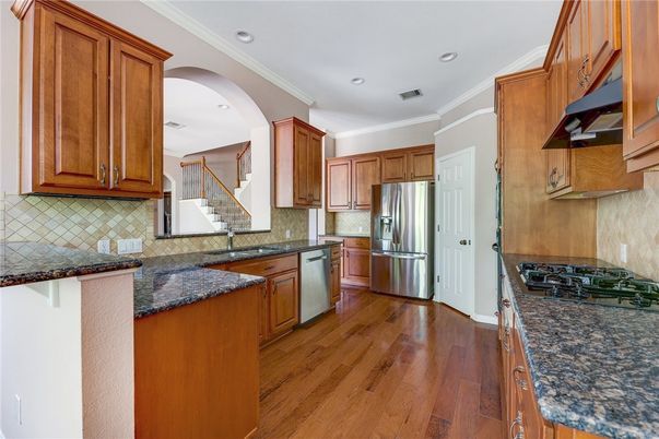 Interior, Kitchen, Recessed Lighting, Stainless Steel Appliances, Wood Texture Flooring