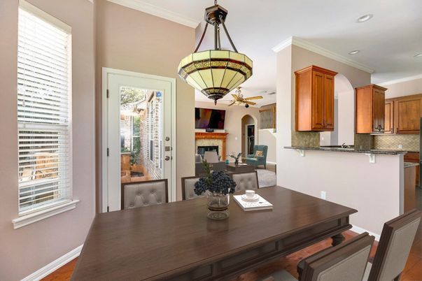 Dining room, Fireplace, Interior, Pendant Lights, Recessed Lighting, Wood Texture Flooring