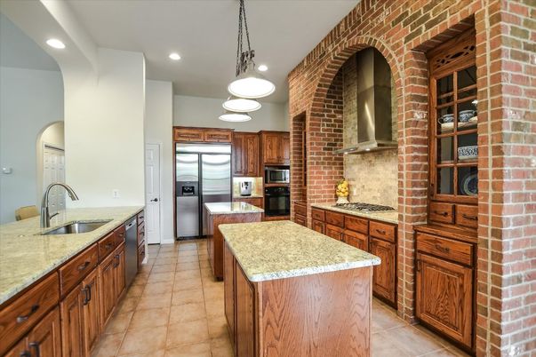 Interior, Kitchen, Pendant Lights, Recessed Lighting, Stainless Steel Appliances, Stone Walls