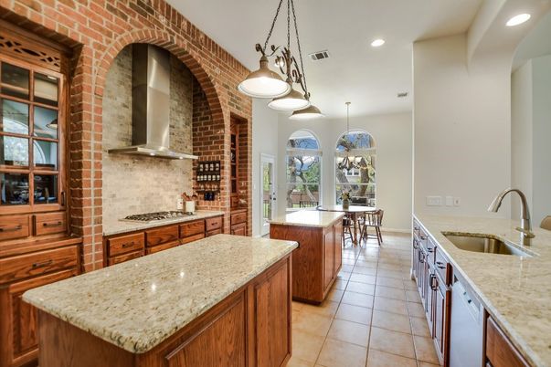 Dining room, Interior, Kitchen, Pendant Lights, Recessed Lighting, Stainless Steel Appliances, Stone Walls