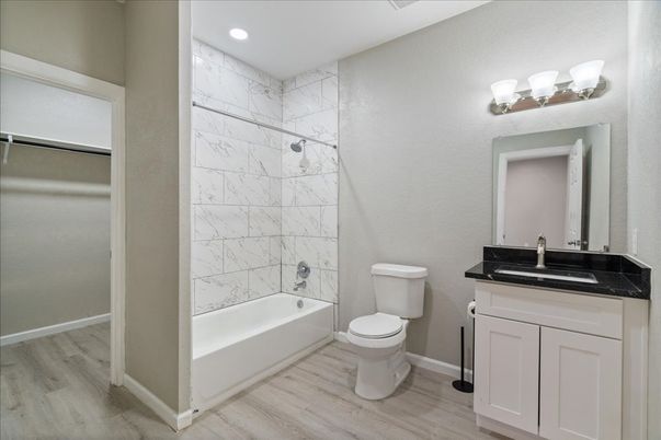Bathroom, Interior, Marble Walls, Recessed Lighting, Wood Texture Flooring