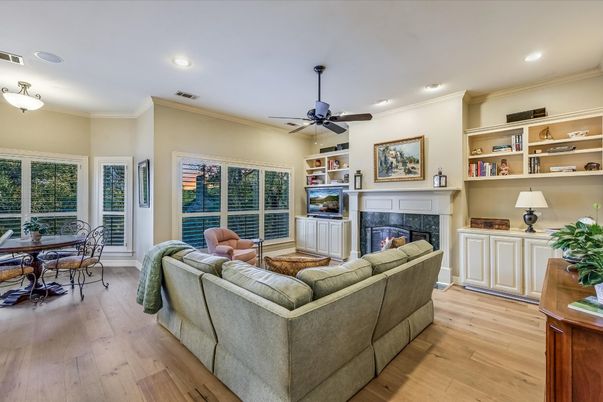 Dining room, Fireplace, Interior, Living room, Recessed Lighting, Wood Texture Flooring