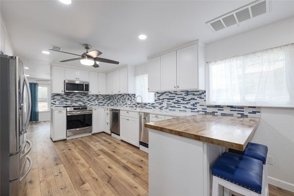Interior, Kitchen, Recessed Lighting, Stainless Steel Appliances, Wood Texture Flooring