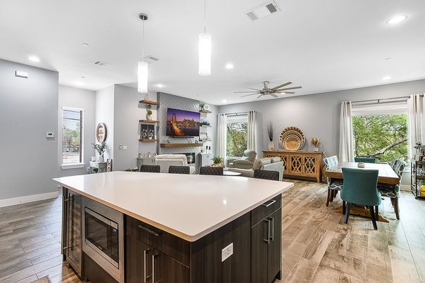 Dining room, Fireplace, Interior, Living room, Pendant Lights, Recessed Lighting, Wood Texture Flooring