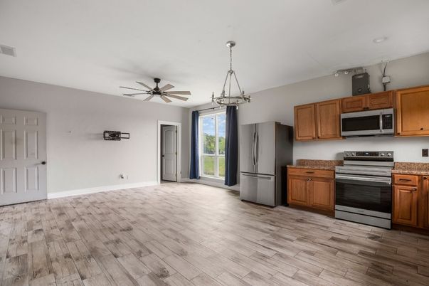Interior, Kitchen, Pendant Lights, Stainless Steel Appliances, Wood Texture Flooring