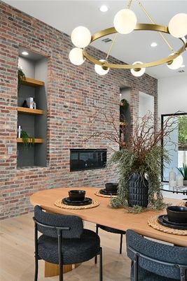 Dining room, Fireplace, Interior, Pendant Lights, Recessed Lighting, Stone Walls, Wood Texture Flooring
